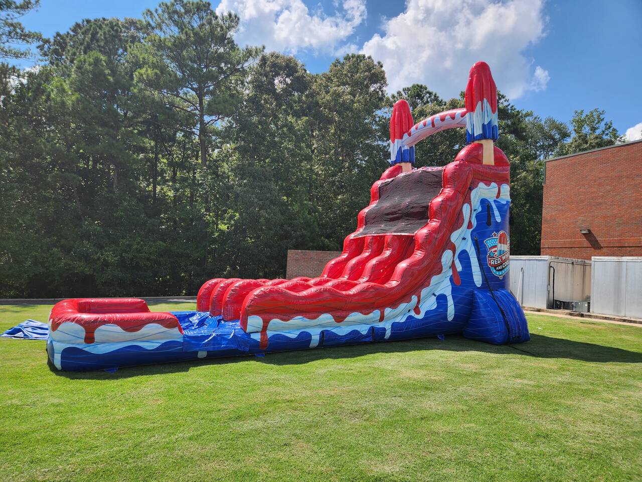 Red, White and Cool Popsicle dual-lane inflatable slide from Wow Inflatables